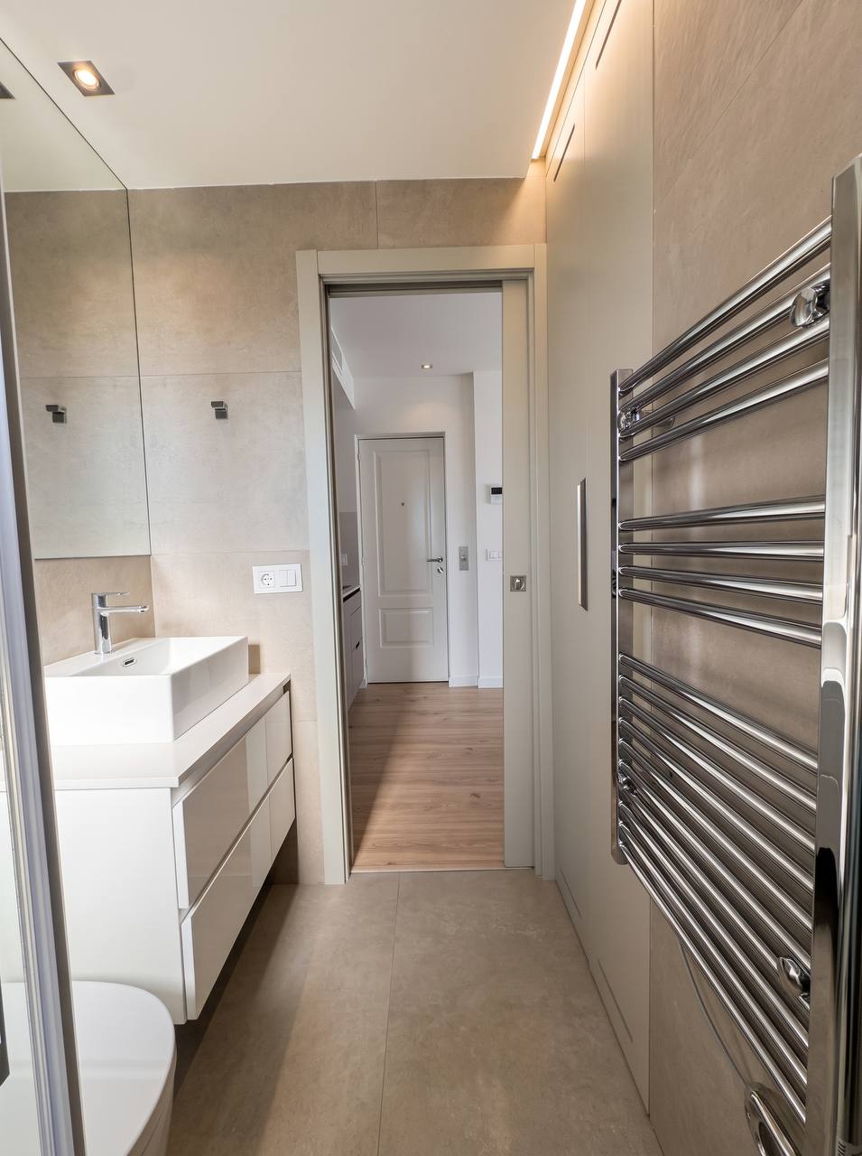 Bathroom with a heated towel rail